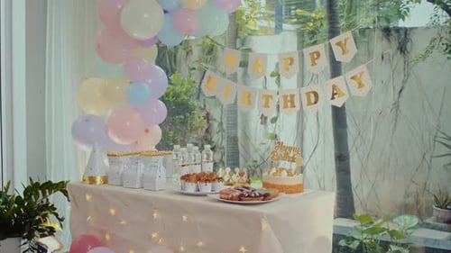 Birthday Party Setup with Cake and Decorations