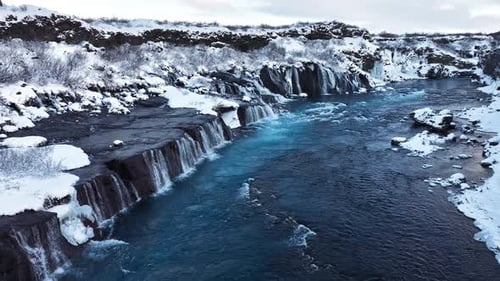 Waterfall in Iceland Snowy Mountain with Cold River in Winter Magical Winter Time Location of Snow