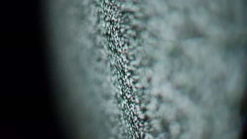 Macro CloseUp of TV Static Noise Flicker on Screen Angle View