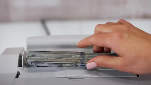 Electronic equipment for counting paper money.