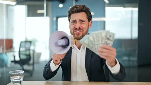 Excited Businessman Announces Success With Money