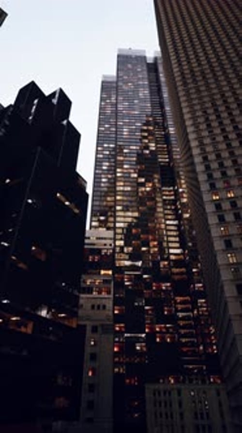 Towering Skyscraper Lights Up City Nightscape