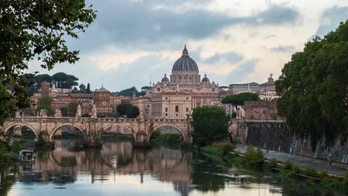 Rome Skyline with the famous Vatican St Peter Basilica and St Angelo Bridge at sunrise