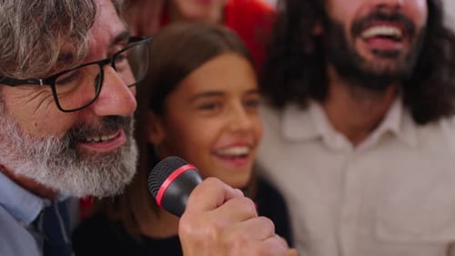Family and Friends Singing Karaoke Together