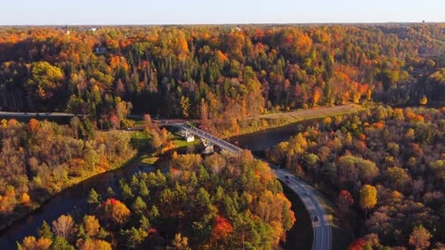 Aerial of Highway Over River in Scenic Sigulda, Latvia, in Autumn