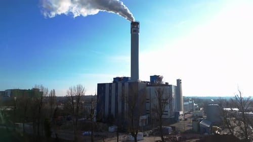 Waste energy plant factory with smoke chimney. Great aerial view flight drone