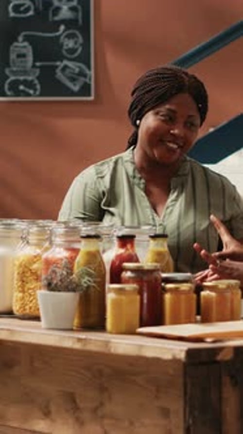 Vertical Video Vendor Presenting Additives Free Bulk Items for Client in Store