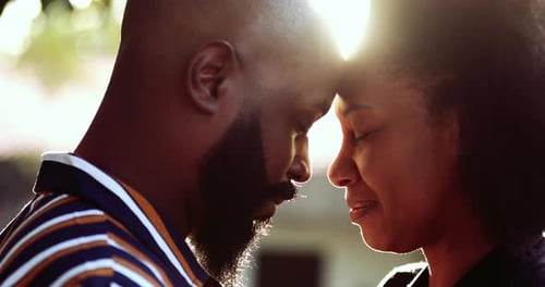 Romantic Couple Forehead to Forehead at Golden Hour