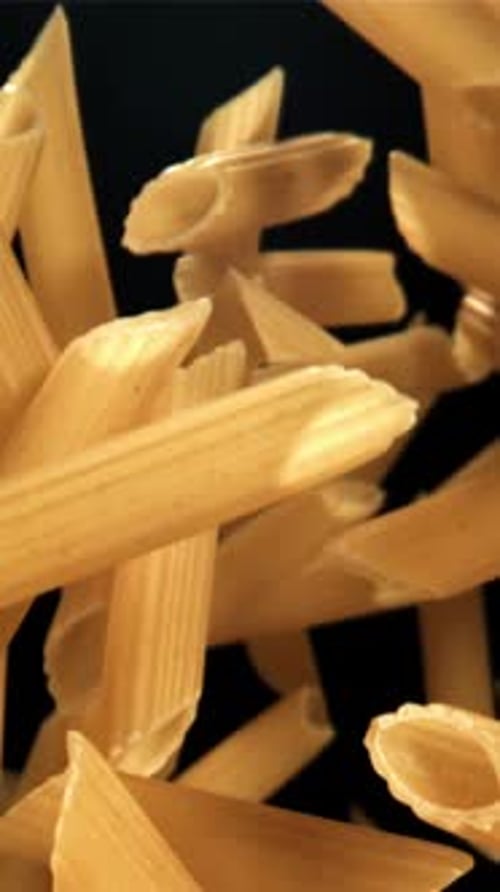 The Penne Pasta Flies Up and Falls Down Filmed on a Highspeed Camera at 1000 Fps