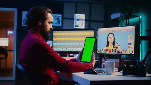 Man Working with Technology in a Dark Office