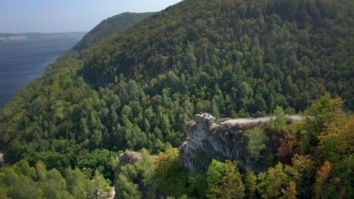 Hikers on the rock. Group of hikers stand on top of the rock ( Camel Rock) and enjoy the view. Zhigu