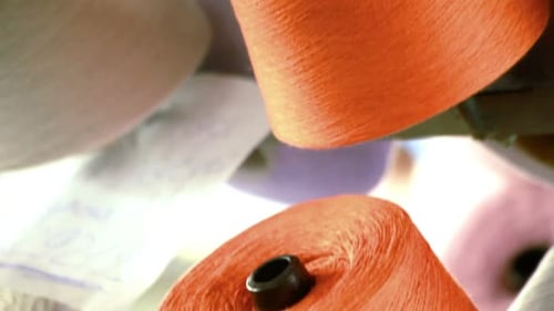 Colorful Yarn Reels at Textile Factory