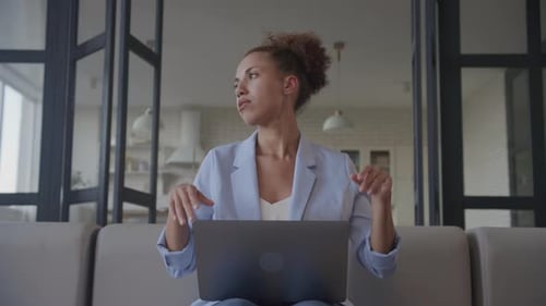 Woman Works At Home and Stretches