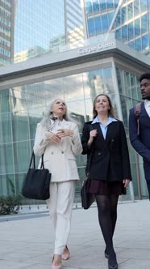 Diverse Group of Colleagues Walking Outside Office Building