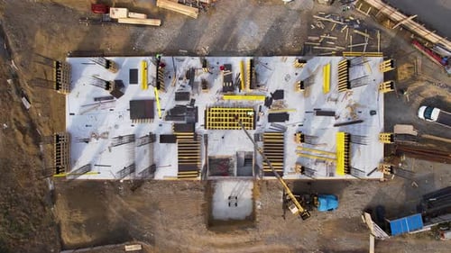 Crane And Workers On The Construction