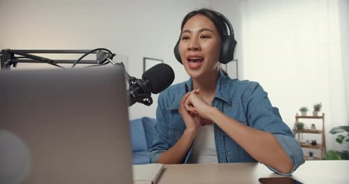 Woman Recording Podcast at Home Studio