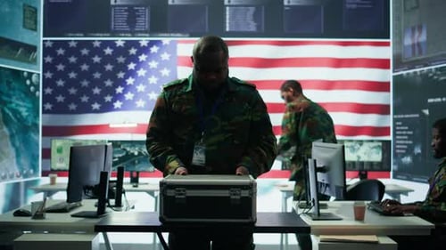US Military Personnel Work in a Modern Army Command Post