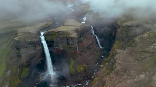 Majestic Haifoss Waterfall Cascading Through the Mountains of Iceland