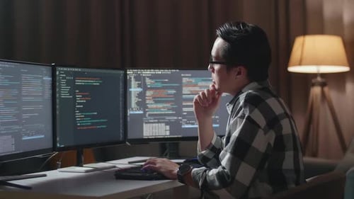 Asian Male Programmer Thinking While Creating Software Engineer Developing App, Program