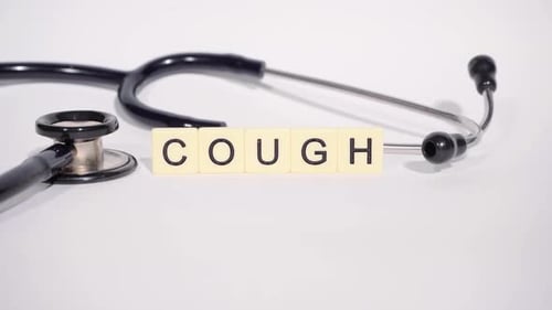 Stethoscope and Cough Block Lettering Medical Concept