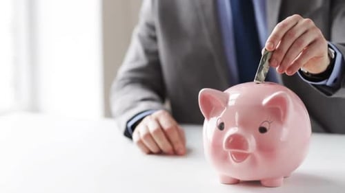 People, Financial Savings, Investing and Economy Concept - Close Up of Businessman