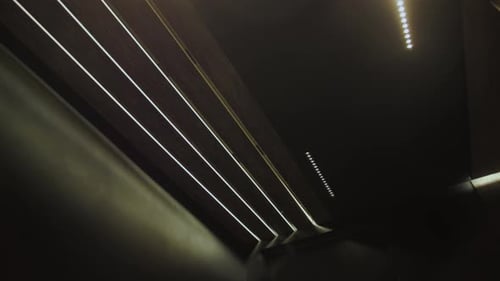 Closeup Modern Hidden Ceiling Lamps in Minimalist Hall Interior Hidden LED Backlight Minimalist