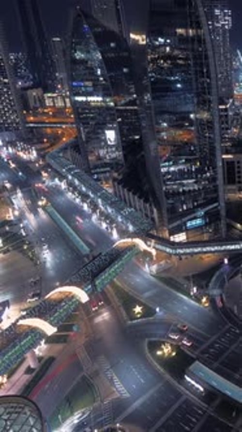 A Stunning Night View of a Vibrant Cityscape with Modern Architecture and Striking Lights