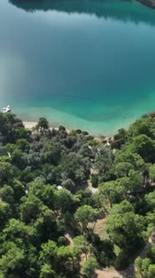 Aerial View of Azure Lake and Sandy Beach