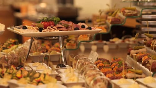 Catering Buffet Food Table Decorated with Delicious Appetizers Presenting a Variety of Options