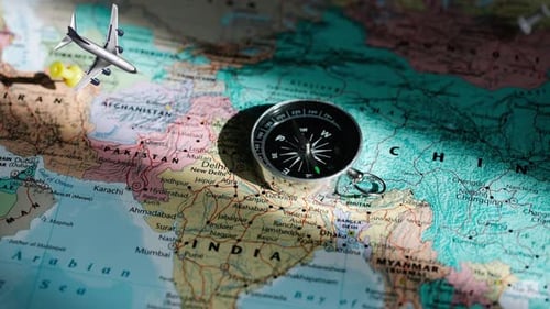 Animated Airplane Flying Over World Map with Compass for Travel and Exploration