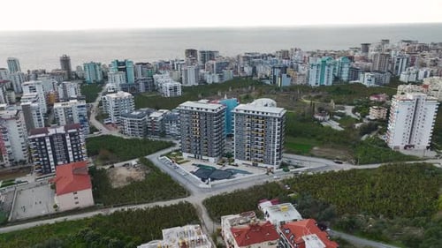 Aerial Video Contemporary Complex Facade with Dramatic Clouds in the Sky Perfect Background