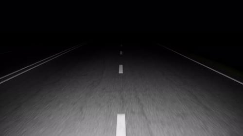 Driving on empty highway at night