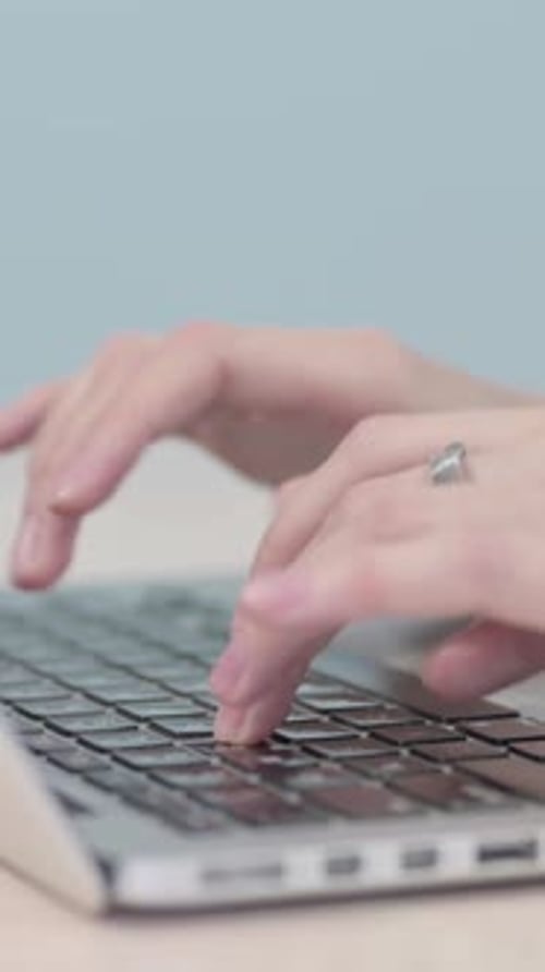 Close up of Hands Typing on Laptop, Vertical Video