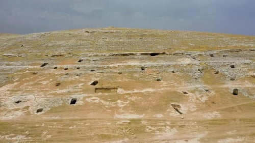Desert Landscape with Cave Openings Aerial View