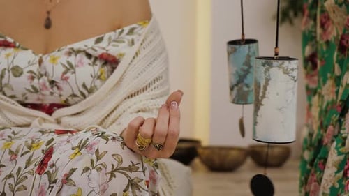 Woman Meditating in a Serene Indoor Setting