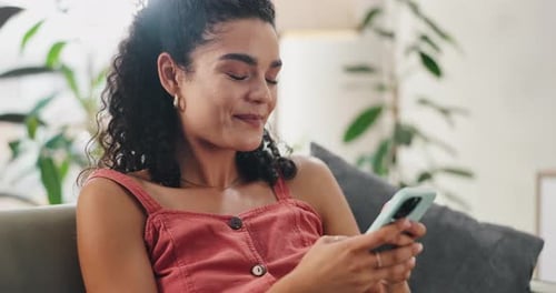 Scroll, phone and woman in home laugh at meme, funny post or girl relax on sofa with social media
