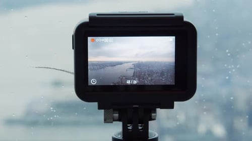 View from an action cam in the One World observatory of the New York City skyline at sunset