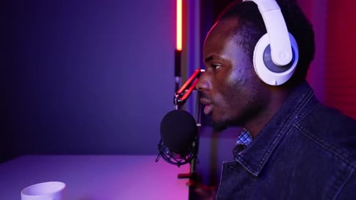 Blogger or Radio DJ Recording in Studio