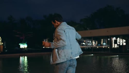 Chilling Guy Walking Late Evening at Water Pool Handsome Italian Man Relaxing