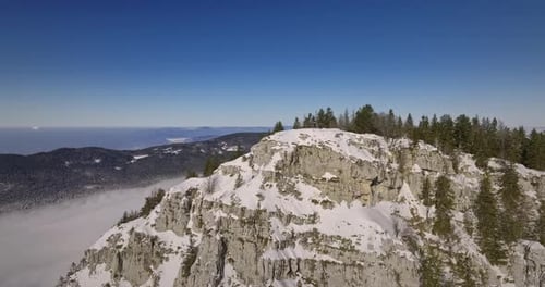 Snow Covered Mountain Peaks Aerial View