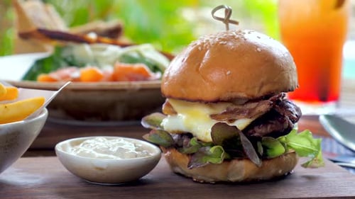 Closeup of a Delicious Beef Burger Served at an Outdoor Restaurant