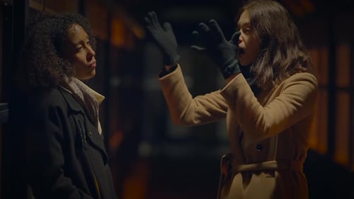 Two Women Having Difficult Conversation in an Urban Setting