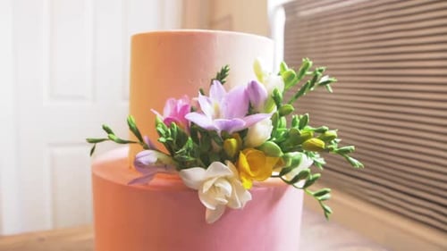 flowery pink tower tier cake