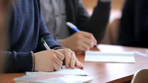 High School Teenage Students at the Desk