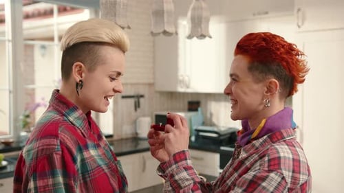Lesbian Couple Engagement Proposal in Bright Kitchen