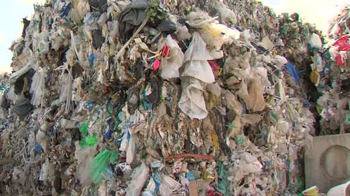 Pile of Compressed Plastic Trash at Recycling Facility