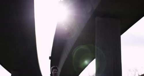 Adult man running athlete sprinting workout challenge training endurance in urban city