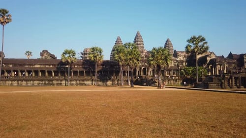 Angkor Wat temple landscape with yellow grass at the front in hot season. Angkor Wat temple in hot s