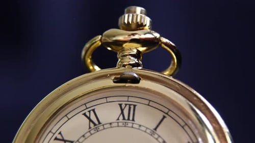 Close Up of a Gold Pocket Watch