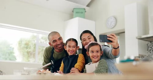 Happy Family Taking Selfie in Bright Kitchen